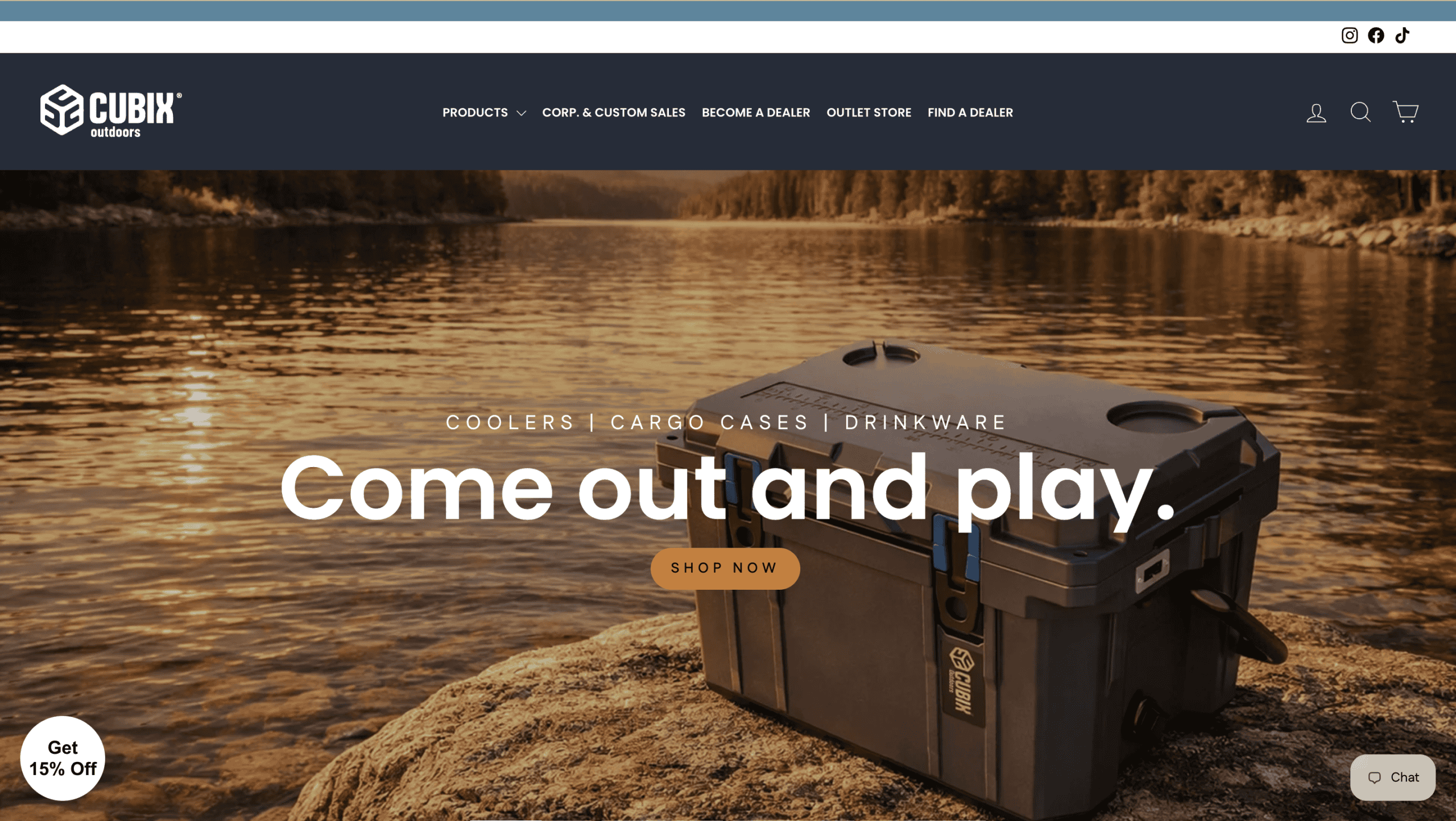 Durable outdoor cooler by Cubix Outdoors on riverbank for camping and outdoor activities.