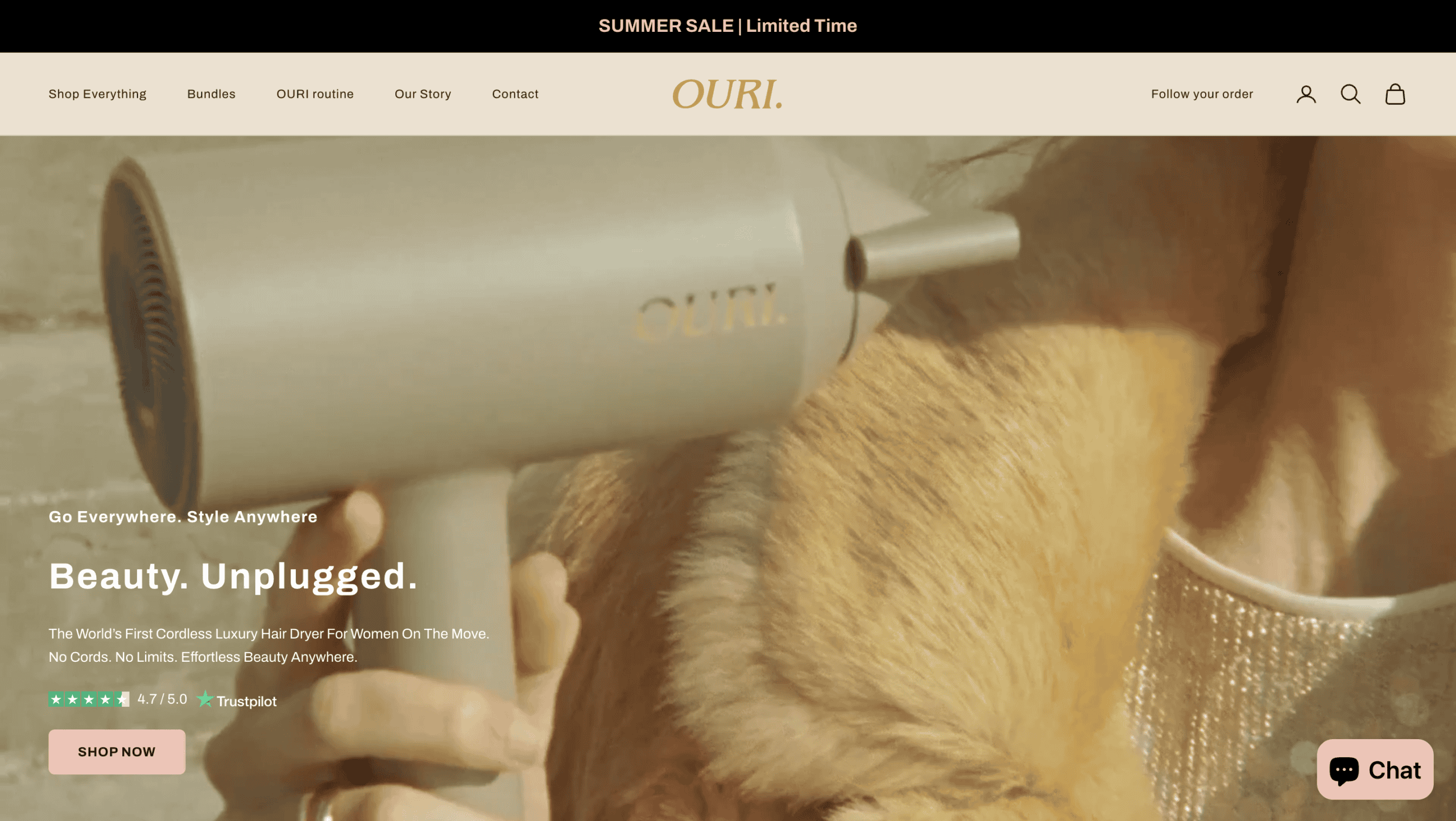 Ouri Beauty hair dryer in use with a dog, showcasing beauty and pet care.