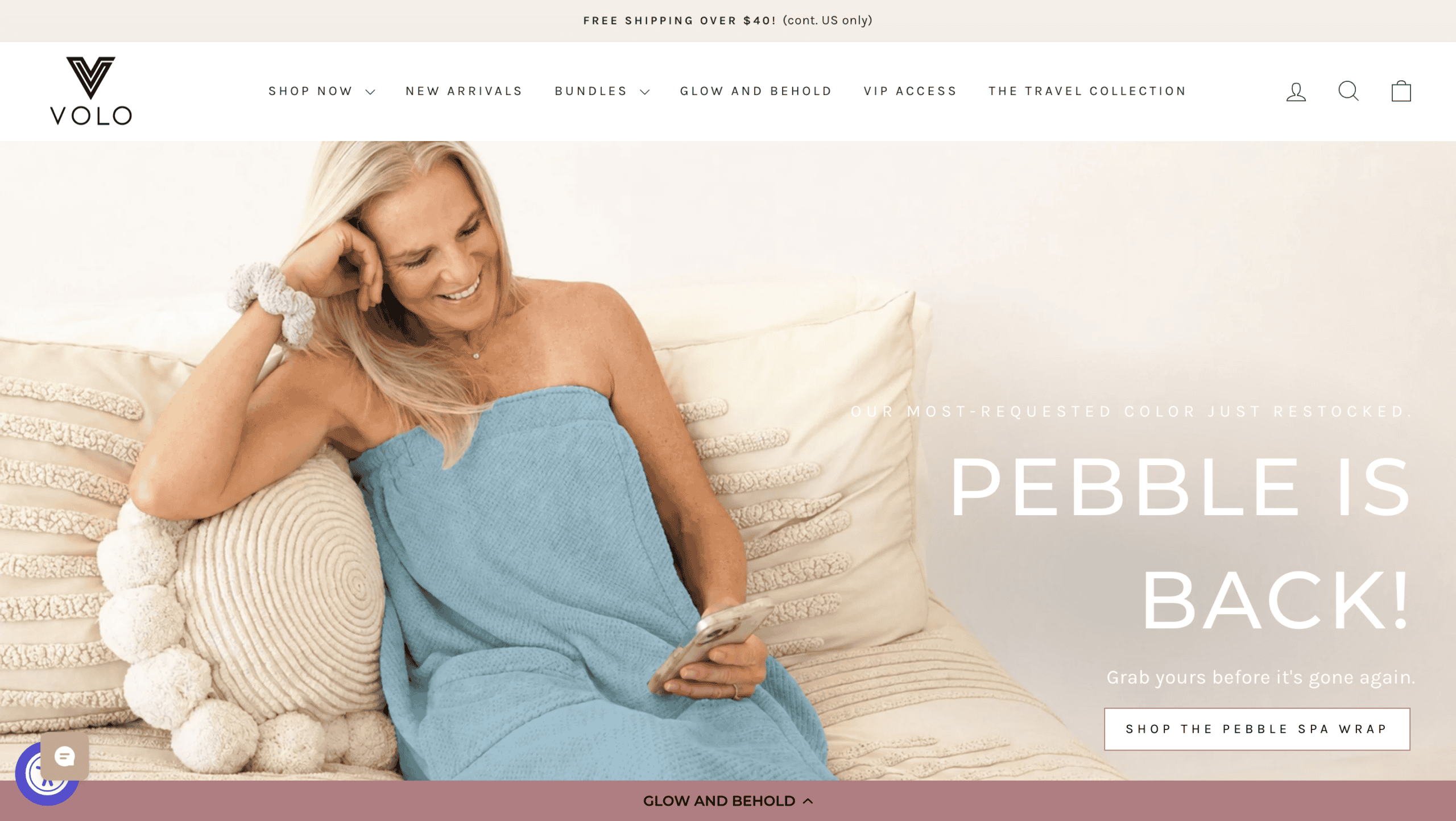 Woman relaxing in Volo Beauty Pebble Spa Wrap at home.